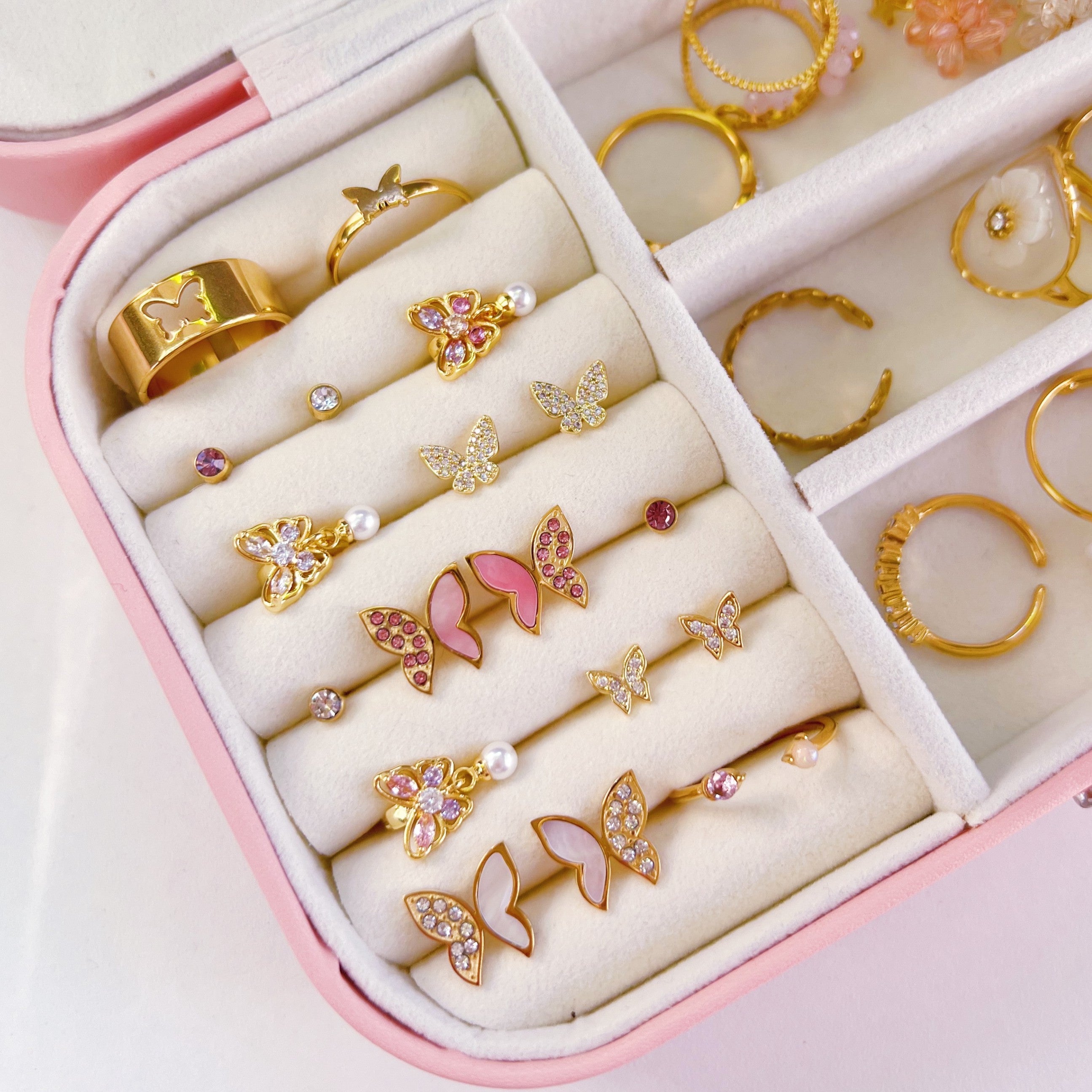 Pearl butterfly hoops paars-roze