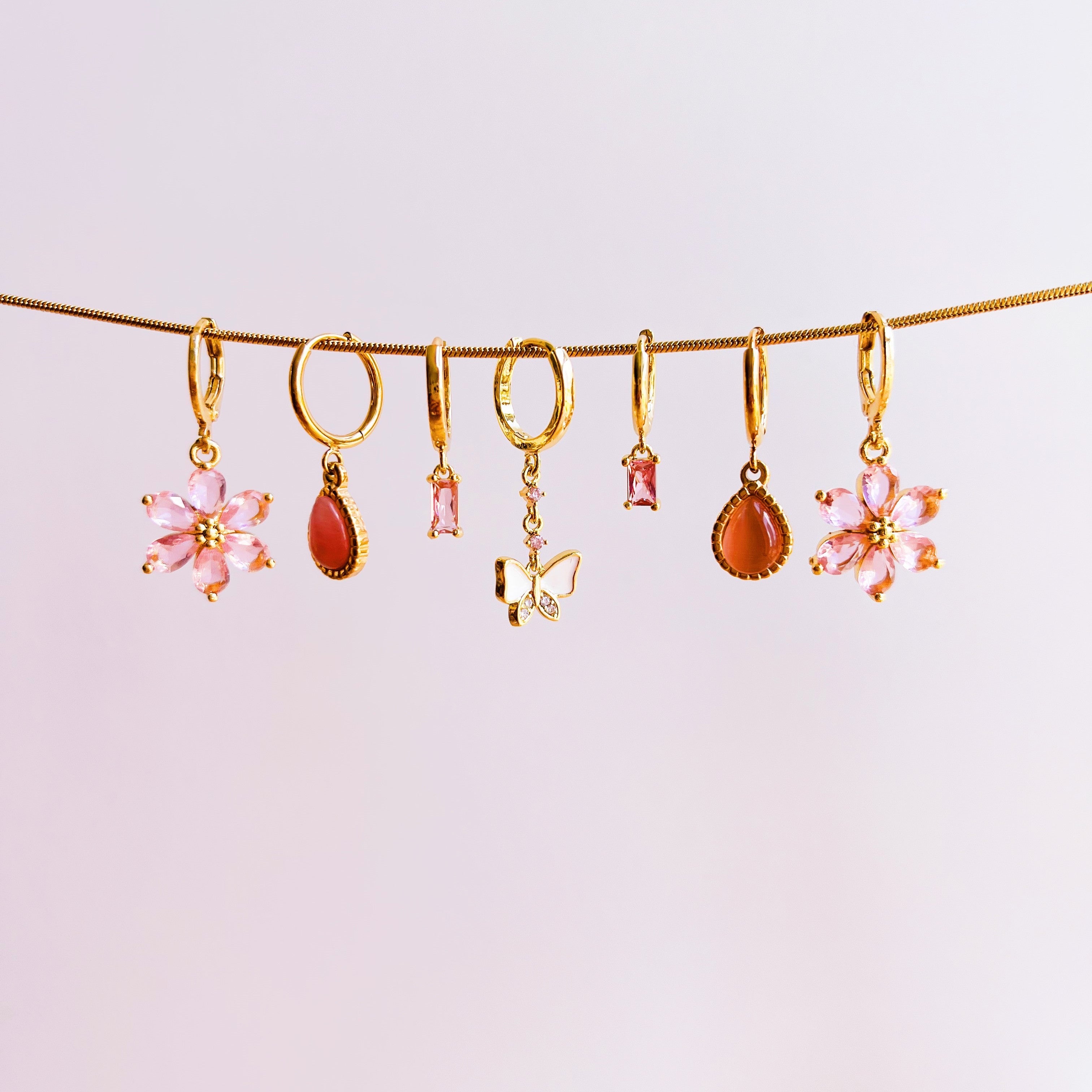 Earrings shining flower pink