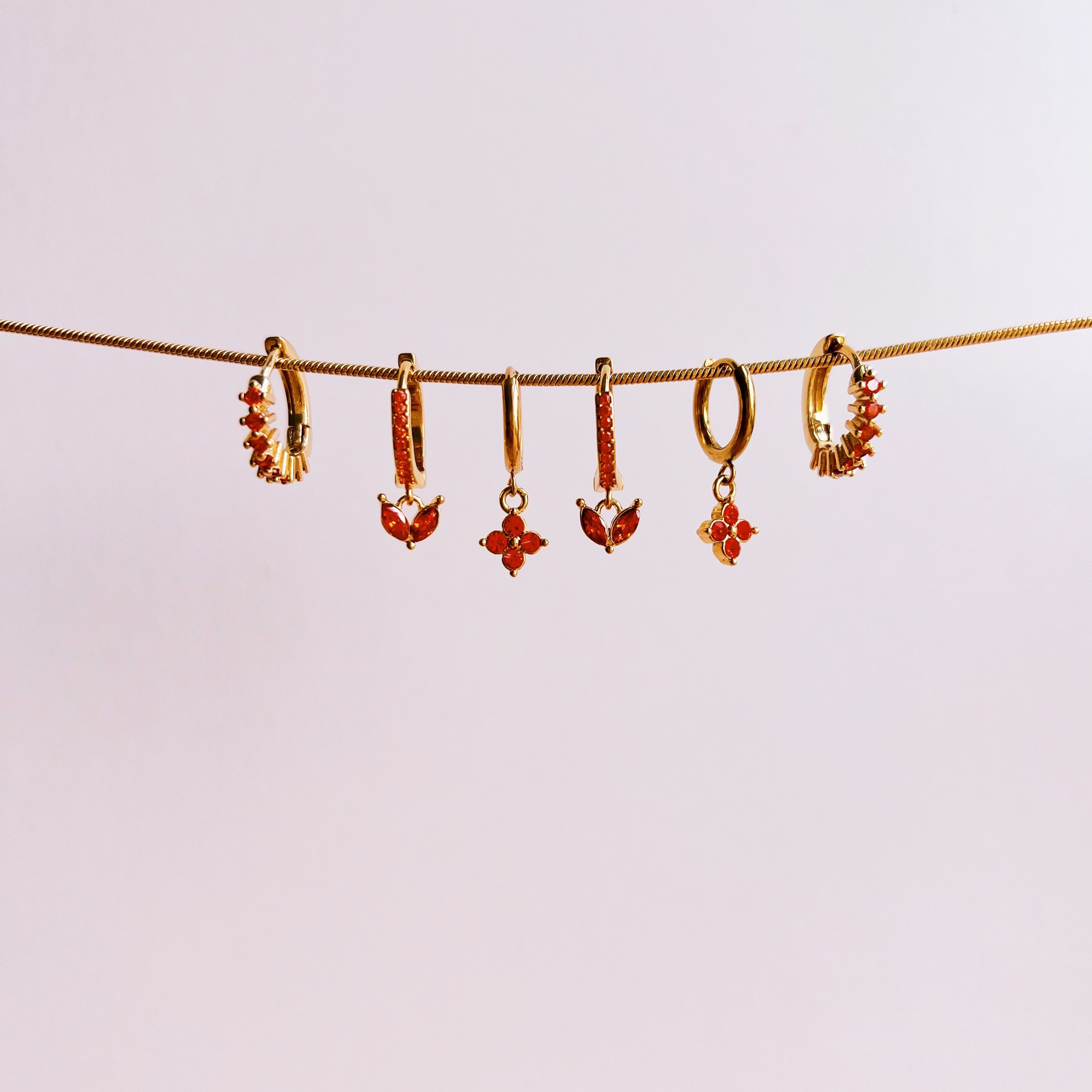 Sparkling diamond hoops orange